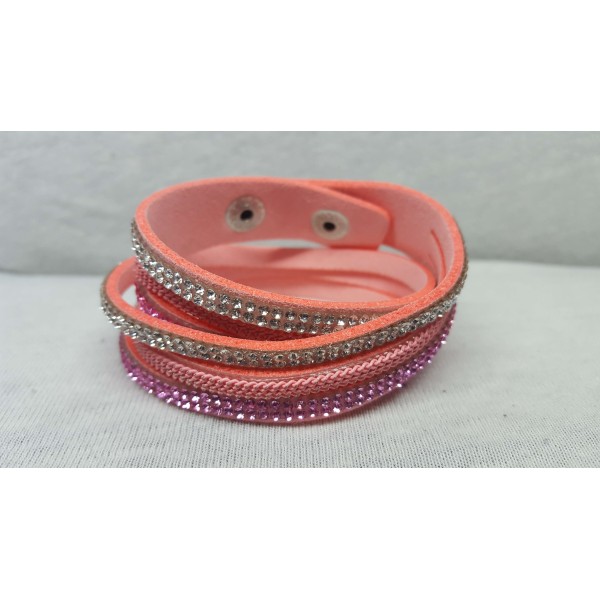 Textile bracelet with crystal type stones, pink color